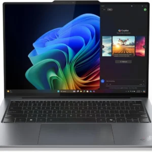 s-l1600 - PARAGONS TECHNOLOGIES LIMITED is a highly versatile and dynamic information and communication technology company Silver laptop open to Windows 11 desktop; Copilot panel visible on the right side of the screen.